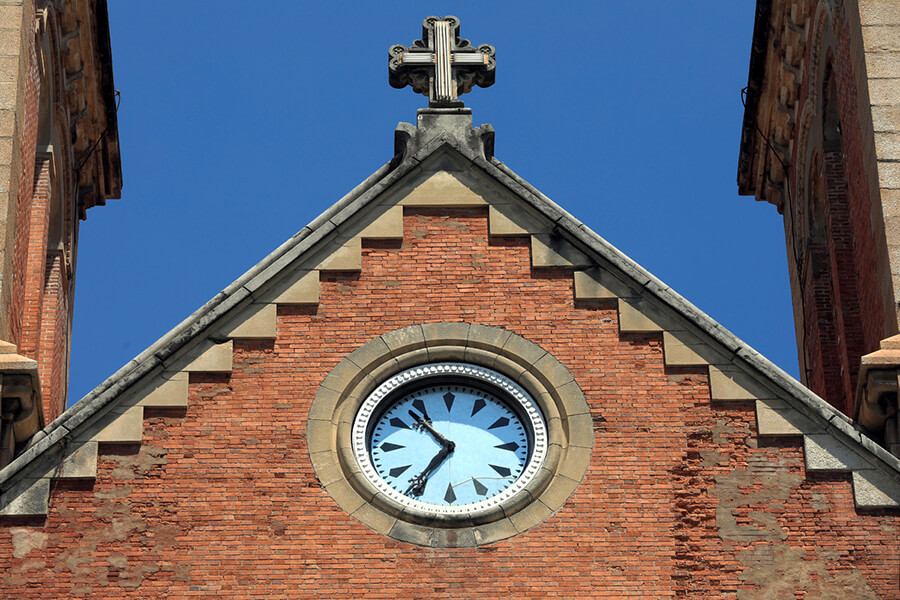 the clock in Notre Dame Cathedral Basilica of Saigon