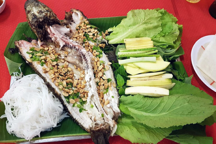 Grilled snakehead fish with straw