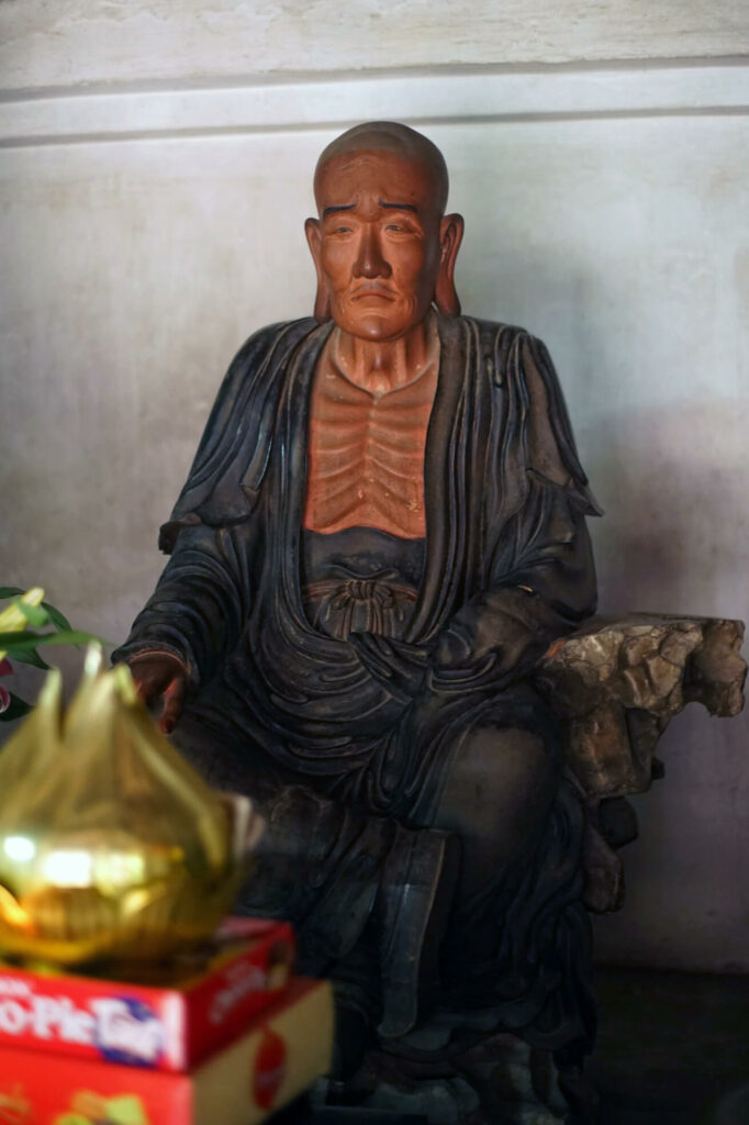 Sanakavasa statue in Tay Phuong Pagoda