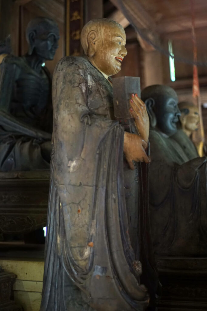 Ananda statue in Tay Phuong Pagoda