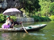 take photo along river in Ninh Binh