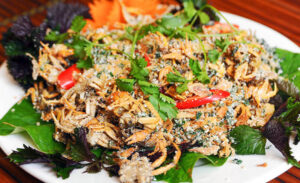 Stir-fried field crab with betel leaves