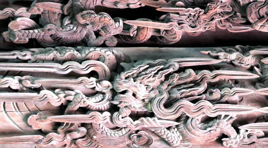 The communal house carved with nearly 400 dragons