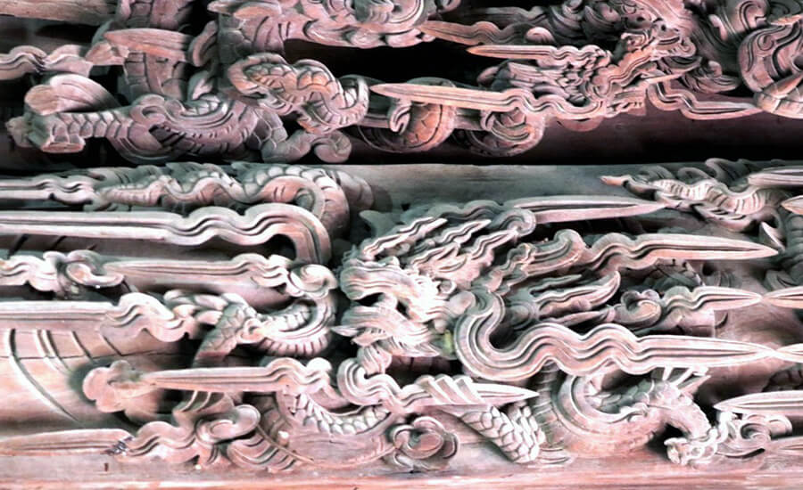 The communal house carved with nearly 400 dragons