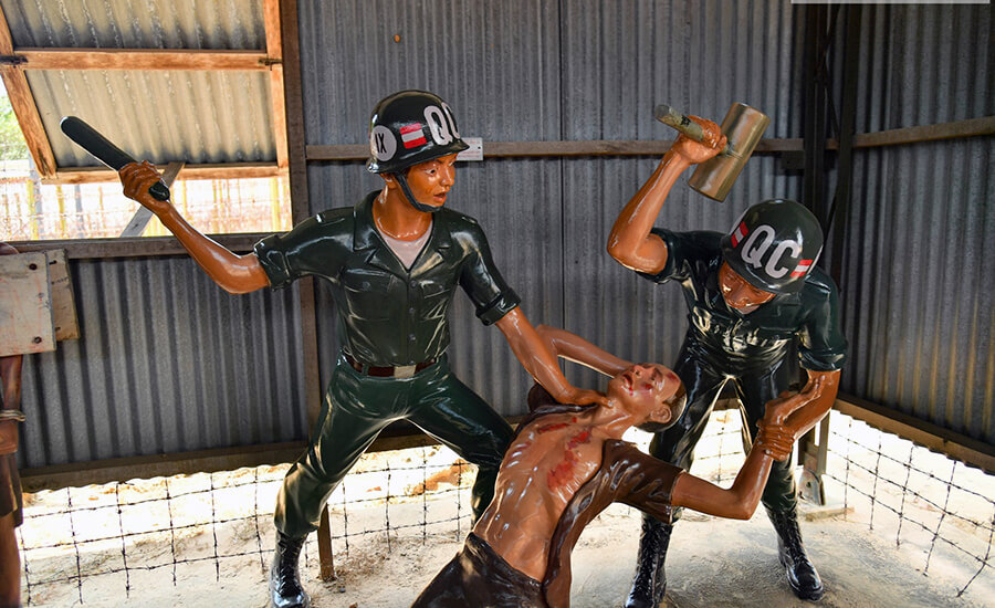wooden sticks to knock out the teeth of the patriotic revolutionary prisoners